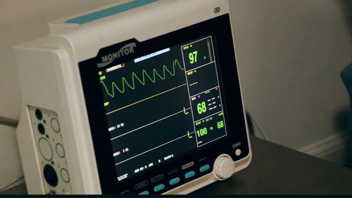A patient monitor displaying vital signs
