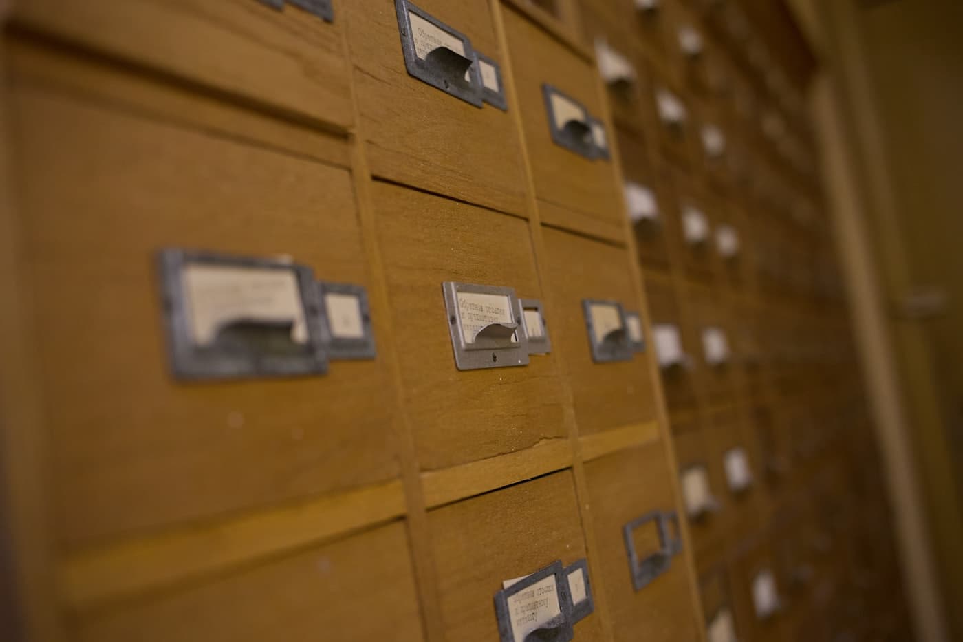 The drawers of a wooden library card catalogue