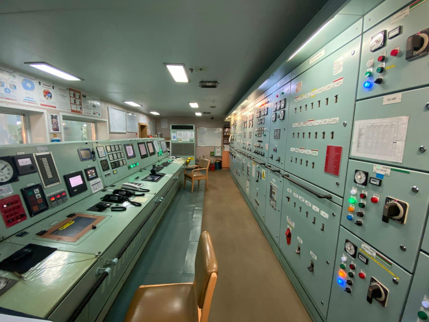 A control room filled with monitoring equipment