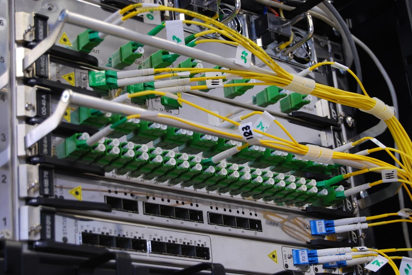 Fibre optic cables patched into a network switch